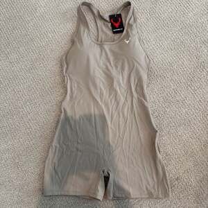 Bucked Up Form Short Bodysuit in Stone beige size xl